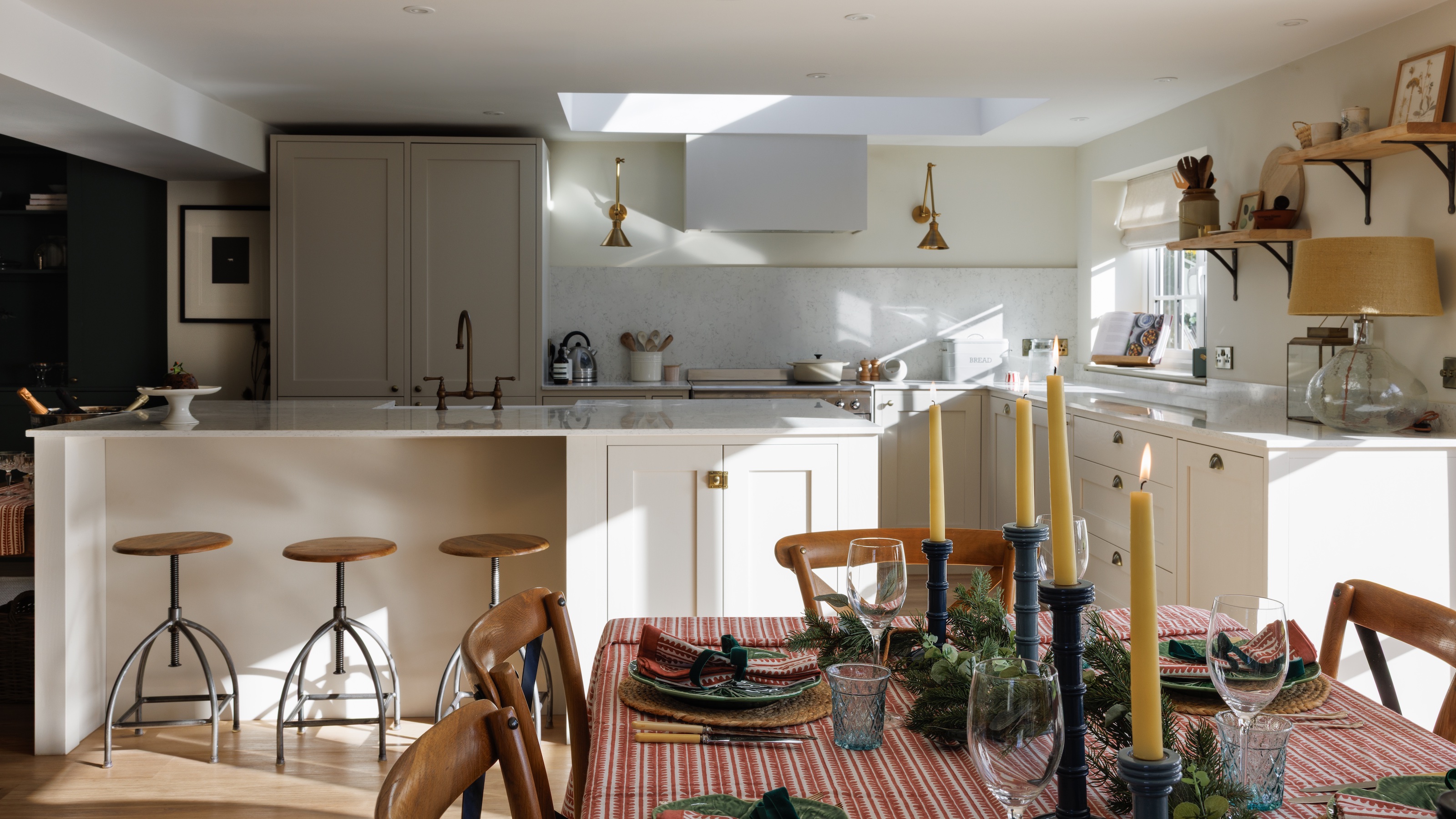 kitchen with farmhouse table decorated for christmas