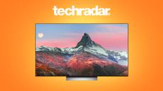 LG C2 OLED TV on orange background