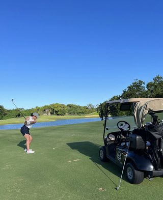 Woman playing golf