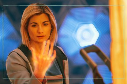 a close of Doctor Who actress Jodie Whittaker looking at her hand