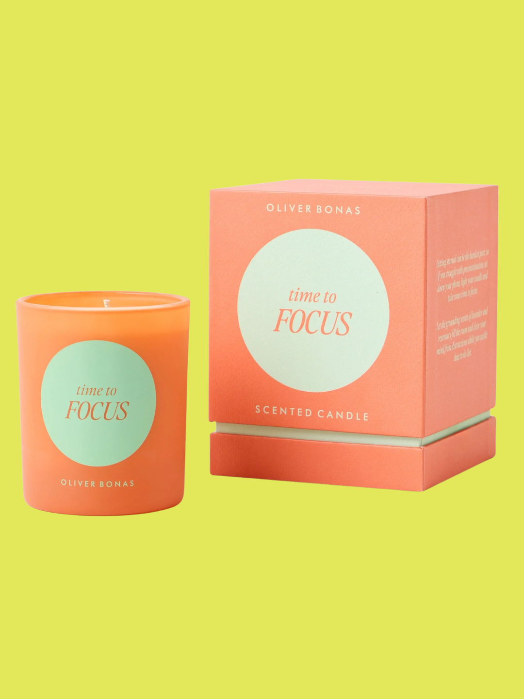 An orange glass candle from Oliver Bonas