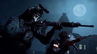 Ghost and an ally move forwards, guns up, in Call Of Duty Modern Warfare 2 – behind them is the moon at night