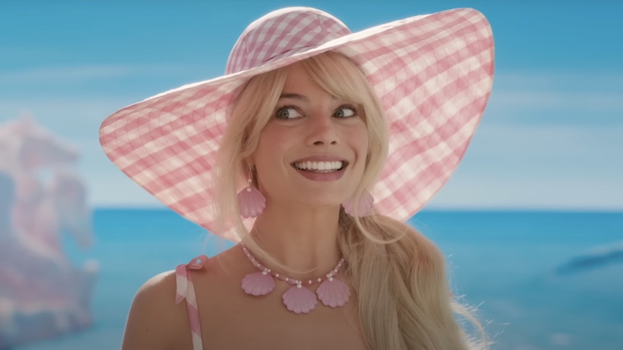 Margot Robbie's Barbie smiling on beach