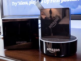 Clockwise from left: Amazon Fire TV Cube, Amazon Fire TV pendant, and Amazon Echo Dot.