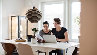 The complete guide to homeowners insurance: couple browsing online