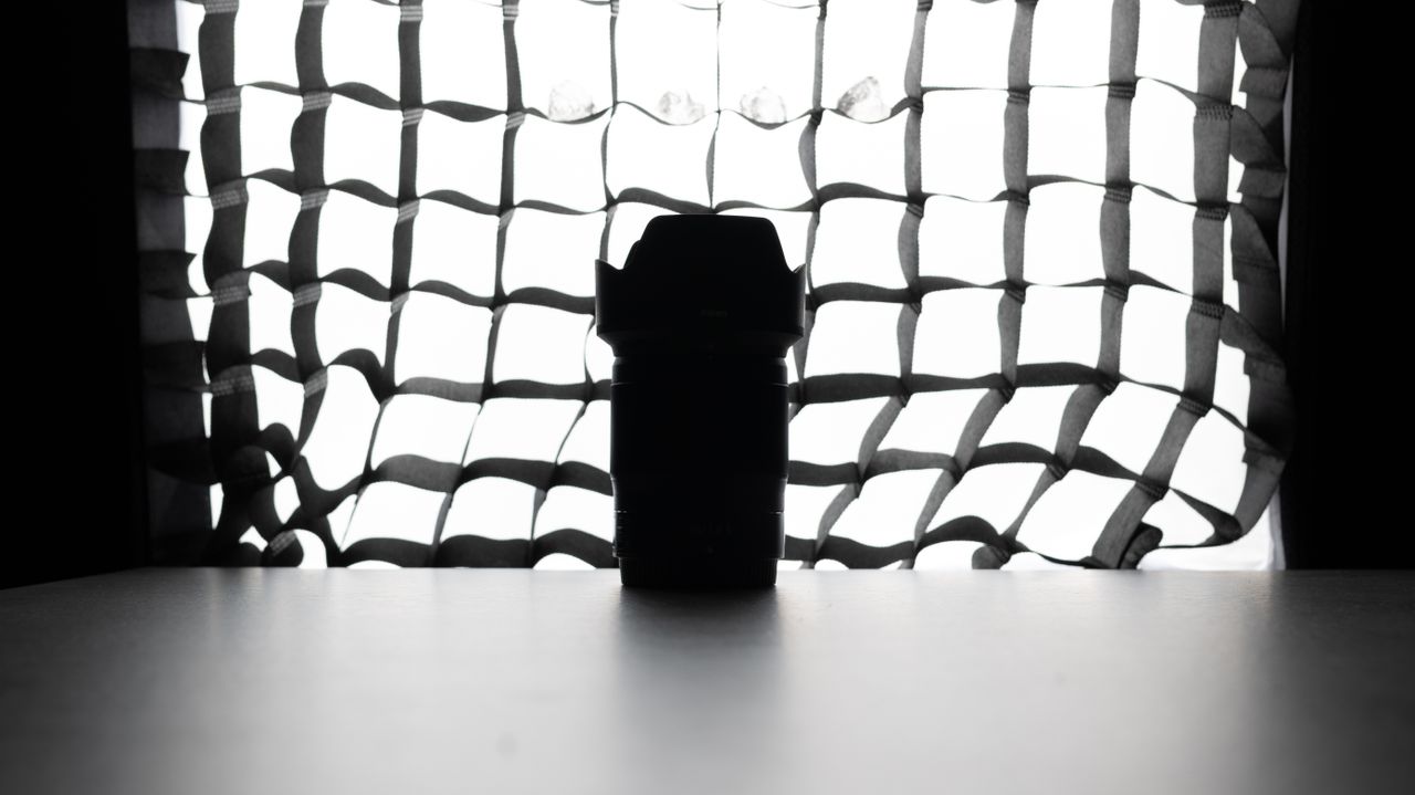 A photo of a backlit lens with a softbox in the background, taken on the Nikon Z50II