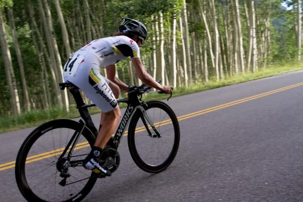 Amanda Miller (HTC-Highroad) races out of the thick Aspen forests toward the setting sun on the Maroon Bells time trial course. Miller finished fourth.