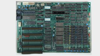 An IBM PC motherboard with ISA bus ports (then AT bus)