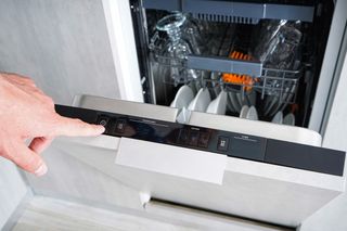cleaning a dishwasher drawer