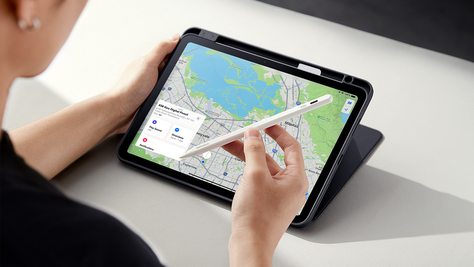 Person using ESR stylus and tablet with ESR case