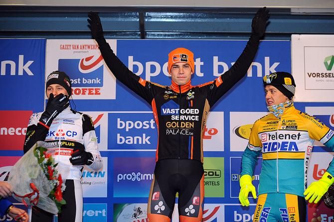 Van Aert salutes victory on the podium at Azencross