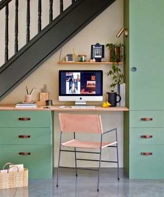 Understairs space turned into a home office with painted ikea units