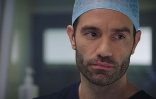 Ramin Karimloo plays Kian Madani in Holby City