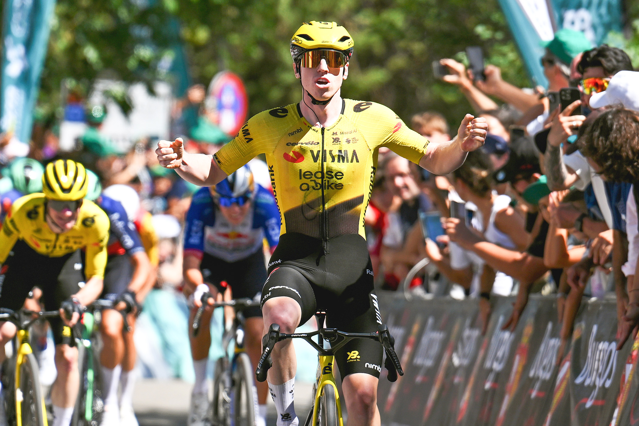 Matthew Brennan celebrates victory on stage 1 of the Vuelta a Burgos