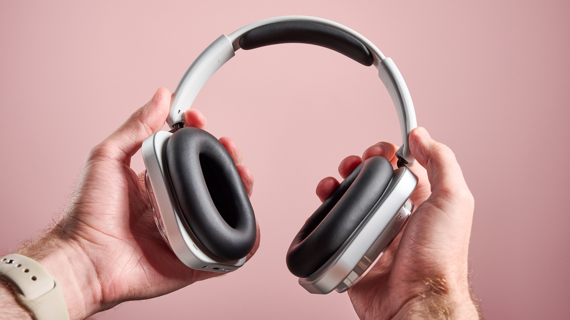 The Nothing Headphone (1) held in hands, flexing the headband