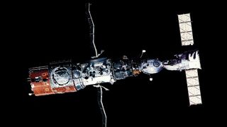 The Soviet Union's Salyut 6 space station (at left) is seen docked with the Soyuz T-4 spacecraft in 1981.