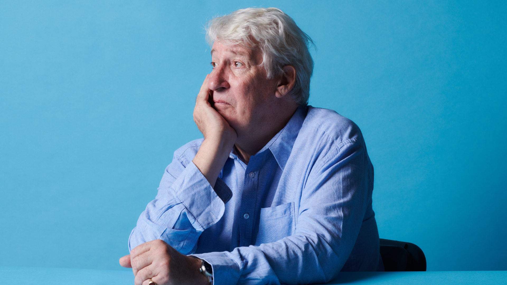 Jeremy Paxman looks off to the left photographed for Paxman: Putting Up With Parkinson's.