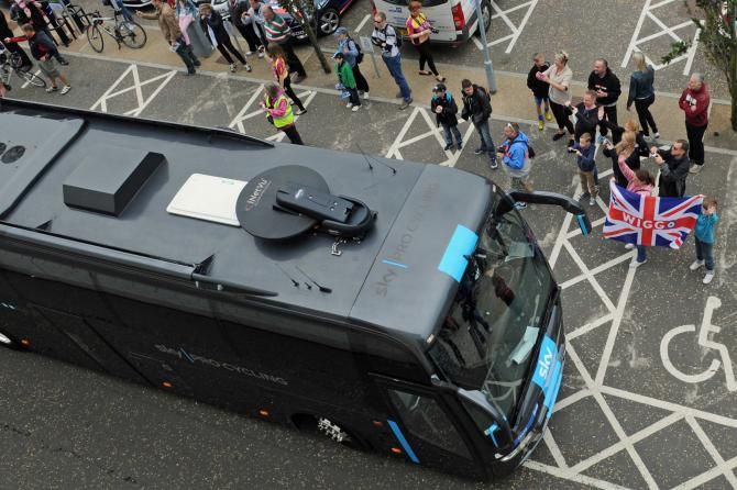 Sky fans await the arrival of the team bus