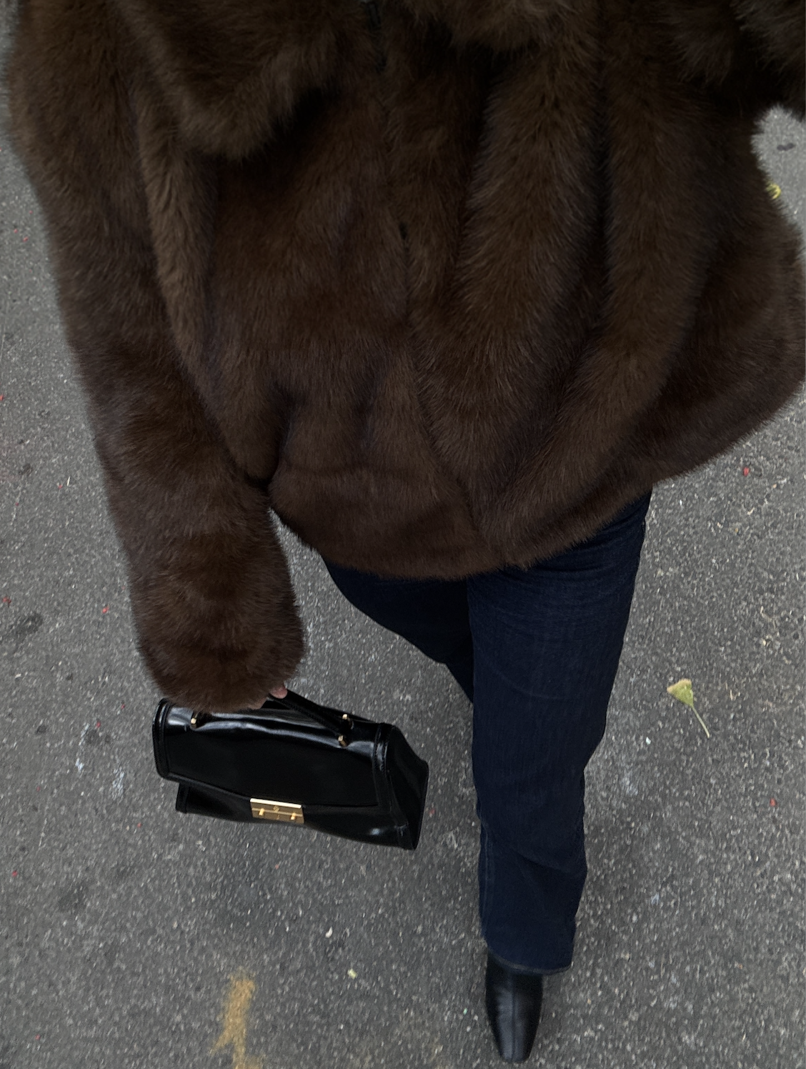 Kathryn Zahorak wearing jeans and fur coat 