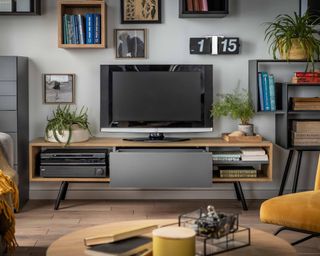A living room media wall using a console table with storage