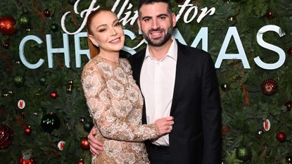 Lindsay Lohan and Bader Shammas attend Netflix’s Falling For Christmas Celebratory Holiday Fan Screening with Cast & Crew on November 9, 2022 in New York City