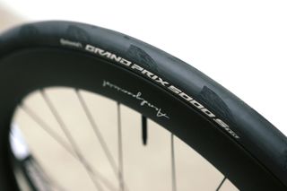 a close up of a black road bike tyre