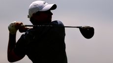 Rory McIlroy hits a driver off the tee