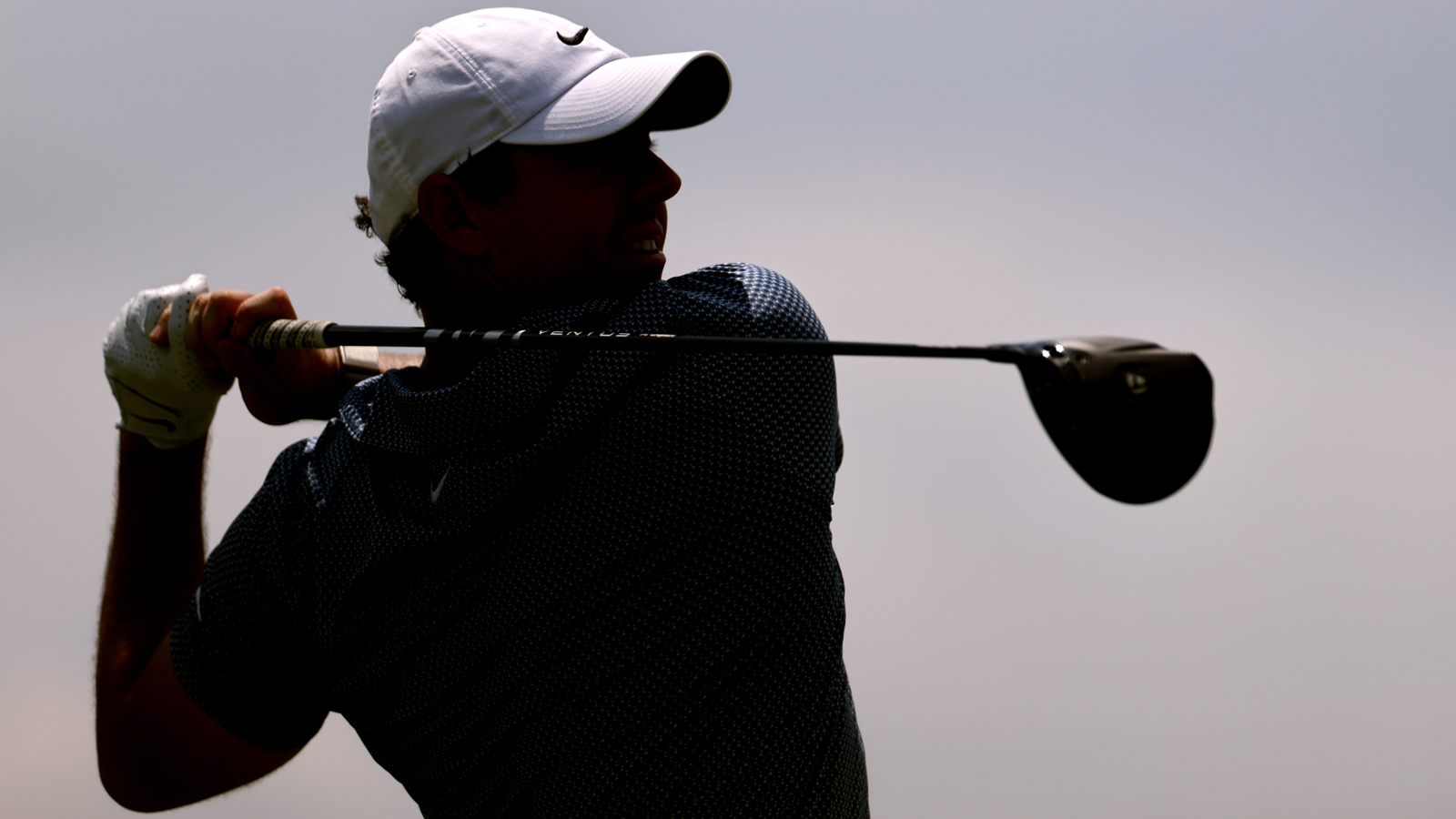 Rory McIlroy hits a driver off the tee