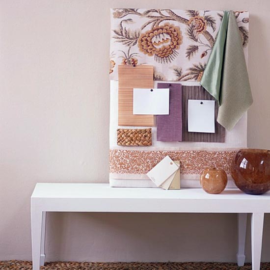 moodboard with fabric pinned and white table