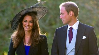 Kate Middleton and Prince William attend Harry Meade & Rosie Bradford's wedding at the Church of St. Peter and St. Paul on October 23, 2010