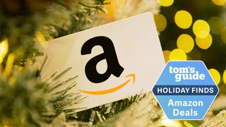 Amazon gift card shown nestled on a Christmas tree