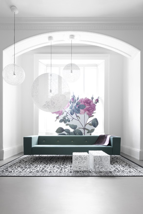 Moooi: Bertjan Pot’s ’Random lights’ hang low over Marcel Wander’s ’Botton’ sofa and ’Crochet’ tables