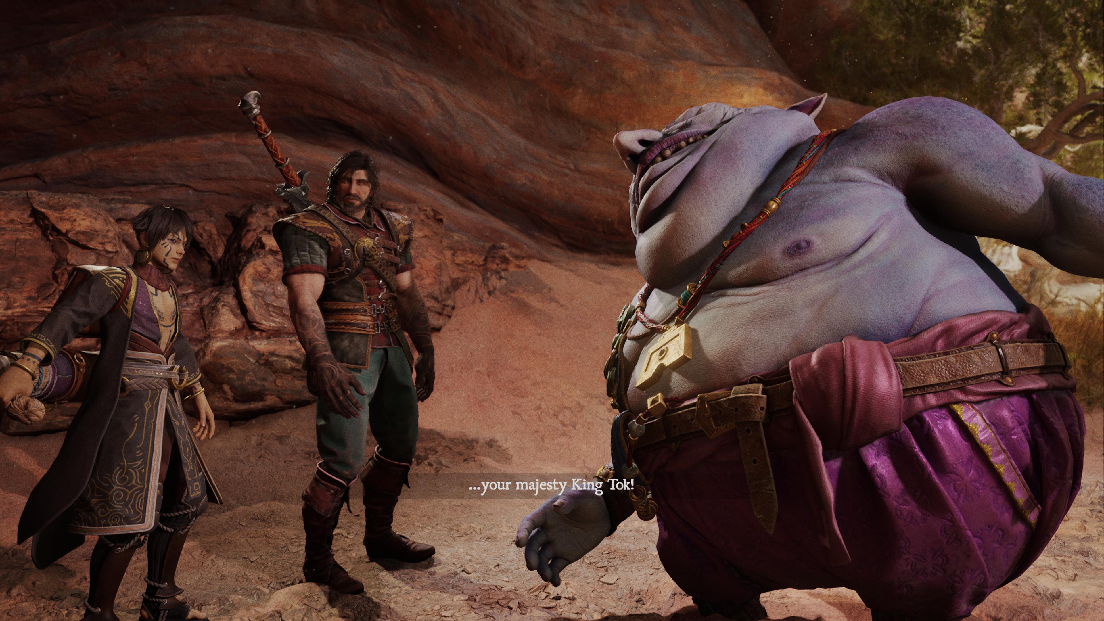 King Tok, a big, round purple troll greets Aran and Adso in Blades of Fire