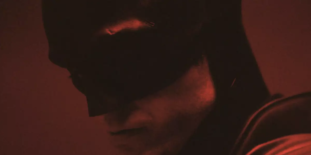 A close-up look at Robert Pattinson wearing Batman&#039;s cowl from a promotional teaser video from &#039;The