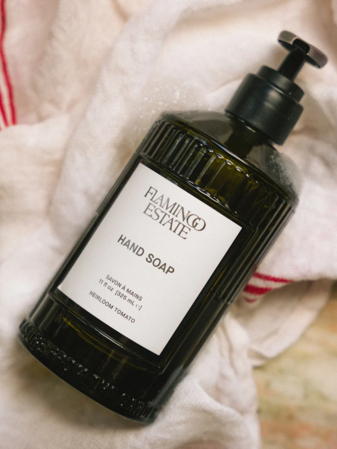 A bottle of tomato hand soap from Flamingo Estate