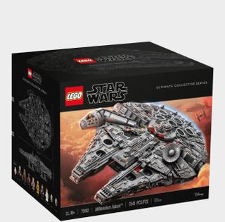 Lego Millennium Falcon box on a plain background