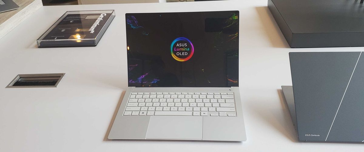 light silver laptop on table