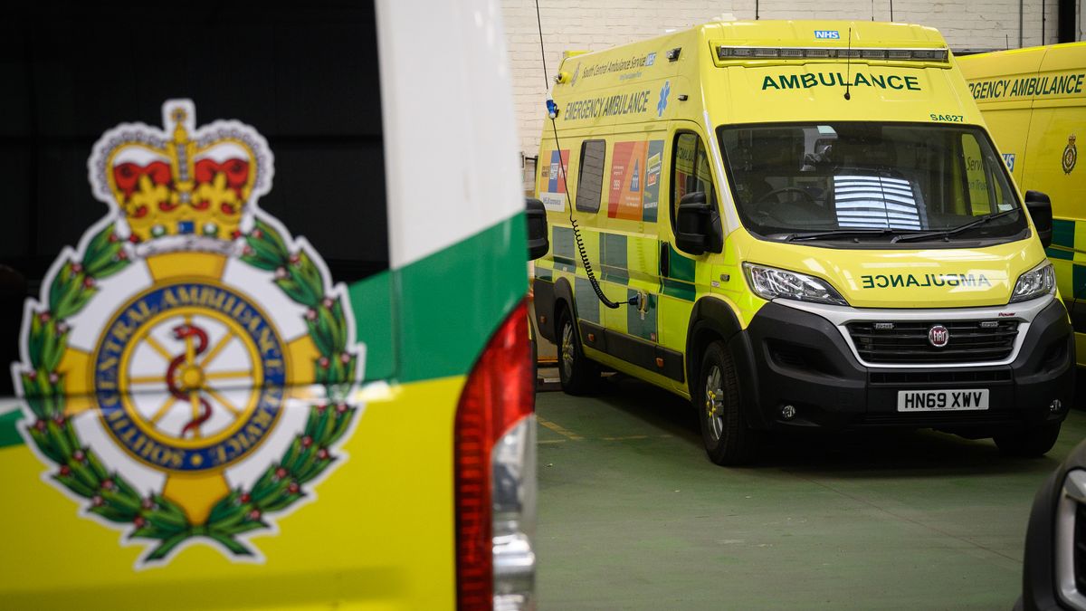 NHS ambulance from the South Central Ambulance Service being charged in a facility, with the service&#039;s logo in the foreground