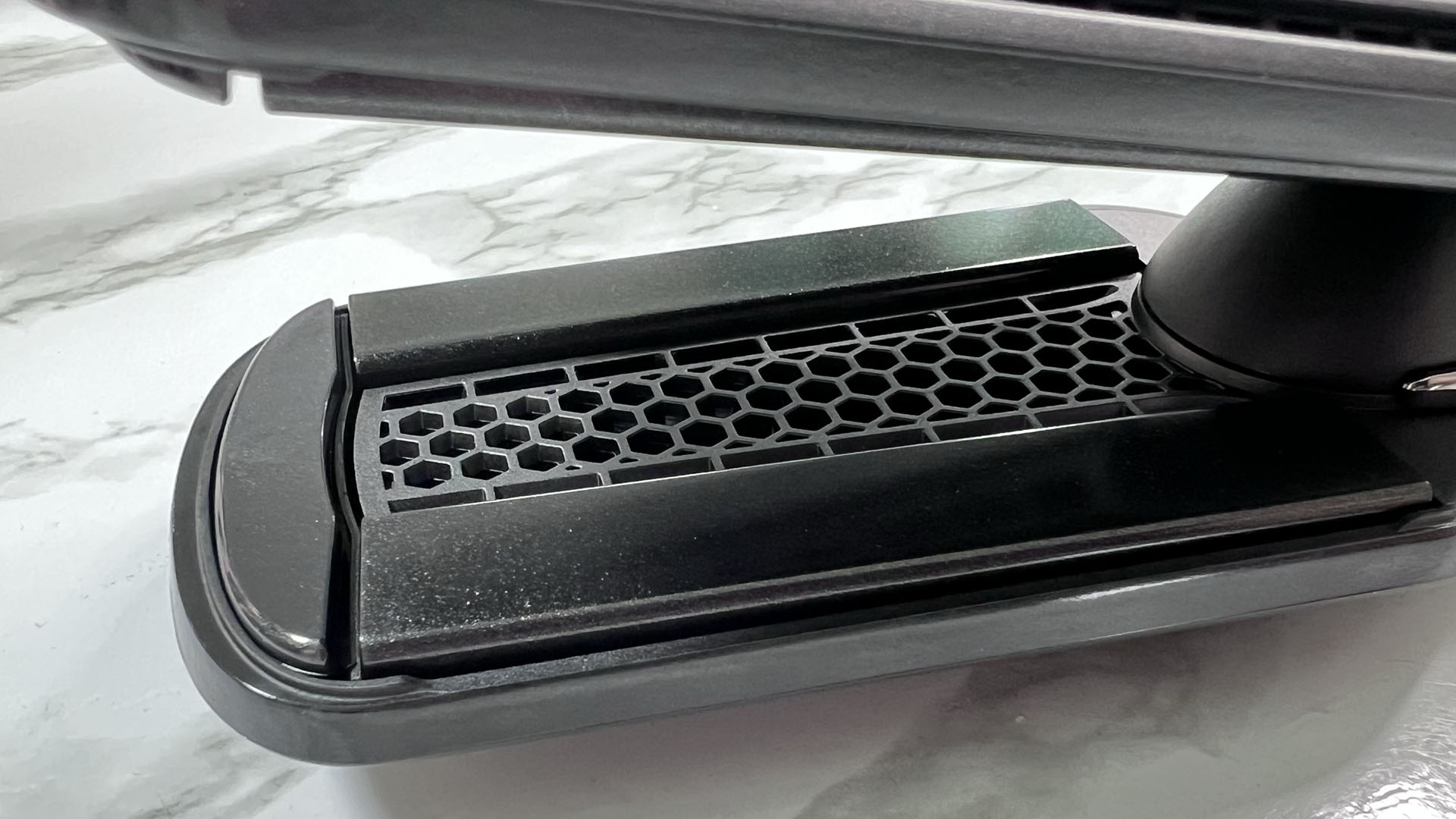 Grille between the plates on GHD Duet Style hair styler