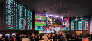 Daktronics LED displays shine bright, displaying sporting odds and event information, at a Las Vegas resort and casino.