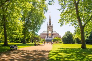 The Albert Memorial with the Royal Albert Hall behind, Kensington Gardens, London.