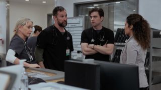 From left to right: Katherine LaNasa looking forward with her right arm on her head, Noah Wyle looking at Sepideh Moafi, Patrick Ball looking at Noah Wyle, Sepideh Moafi looking at Noah Wyle in The Pitt.