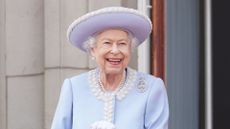 Queen Elizabeth II watches from the balcony of Buckingham Palace during the Trooping the Colour parade, 2022