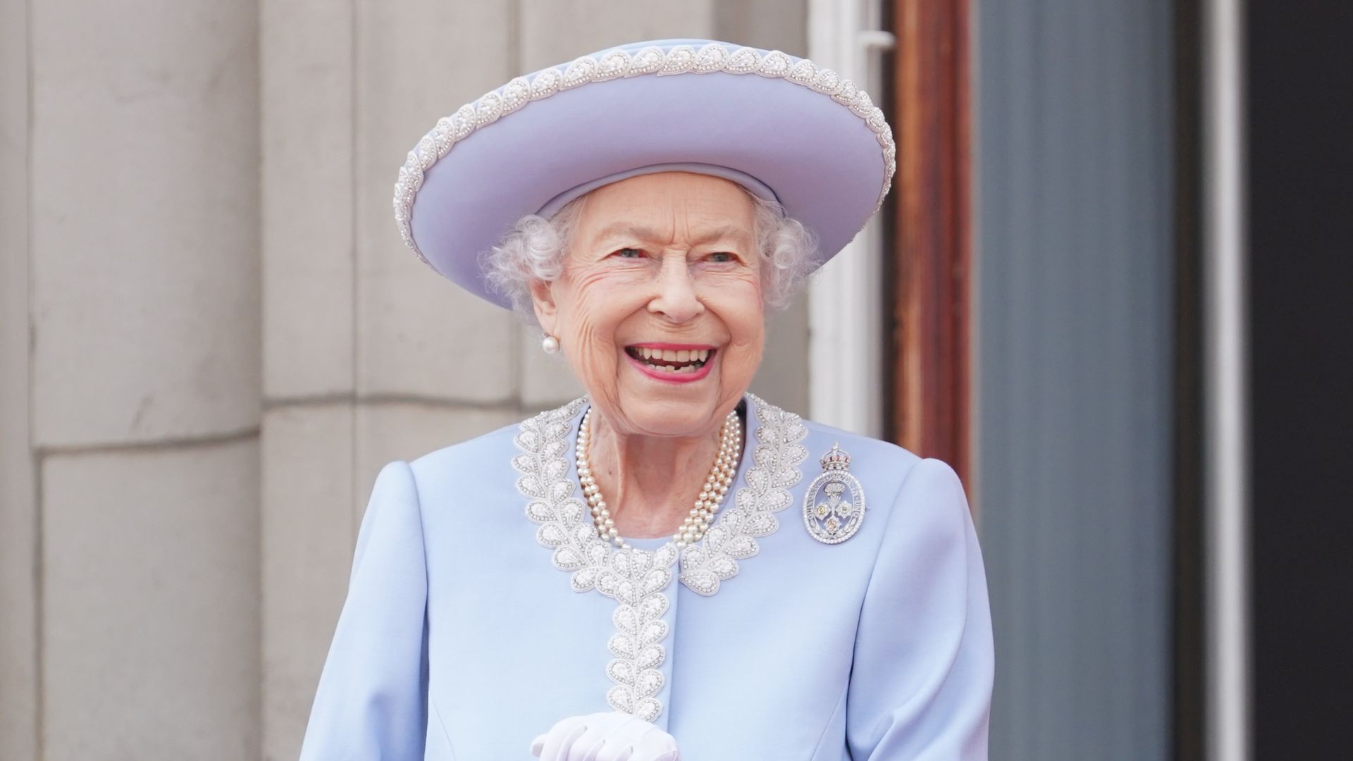 Queen Elizabeth II watches from the balcony of Buckingham Palace during the Trooping the Colour parade, 2022