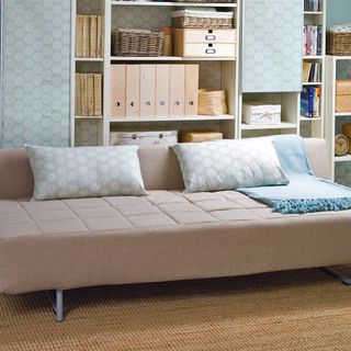 attic living room with sofabed