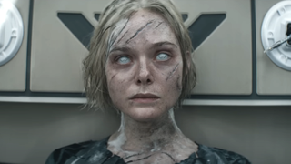 Elle Fanning as Thea in Predator: Badlands
