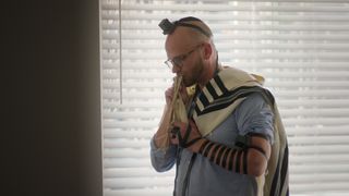 Noah Dreyfuss at prayer in Jewish Matchmaking