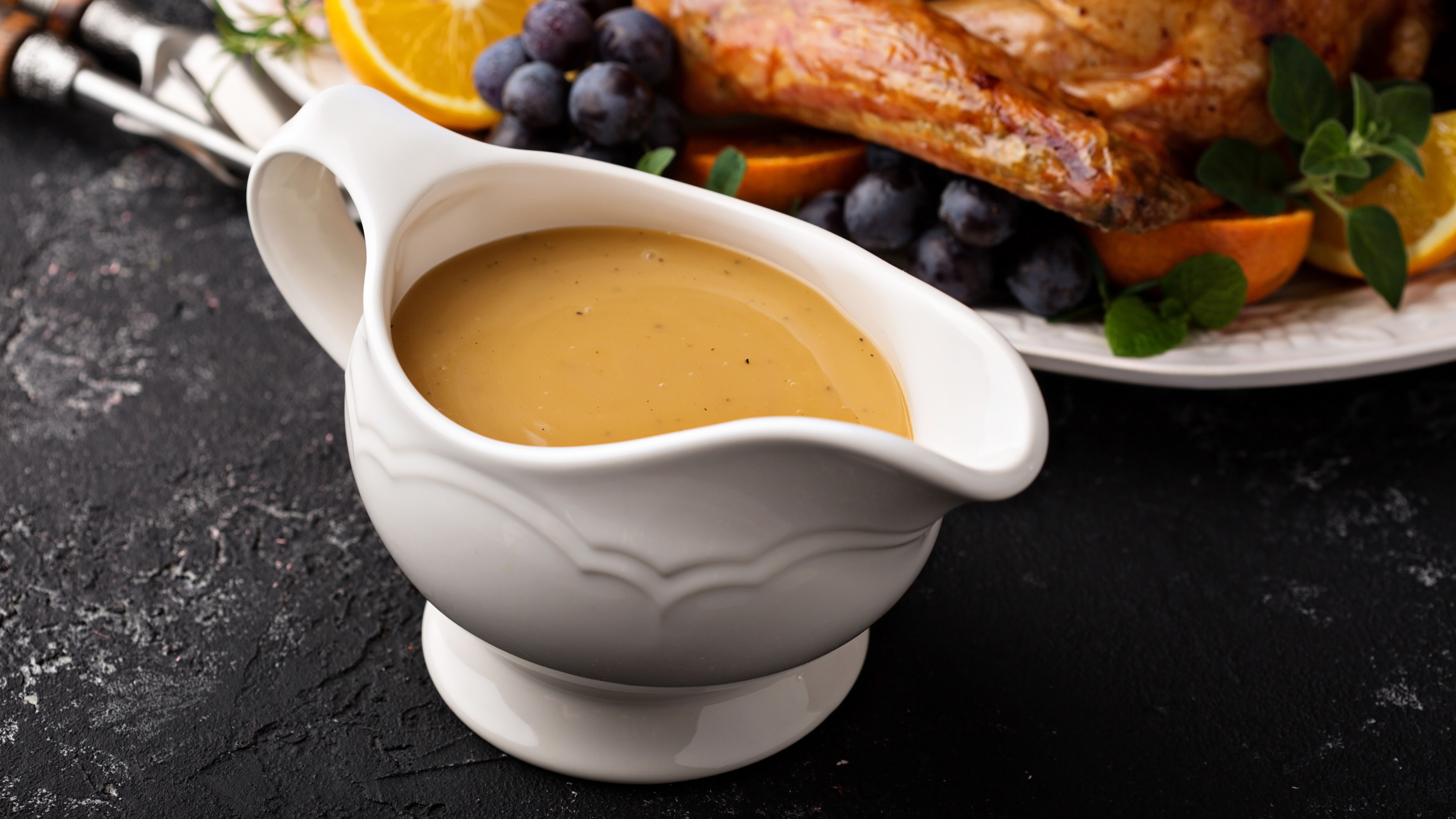 Gravy boat at the dinner table