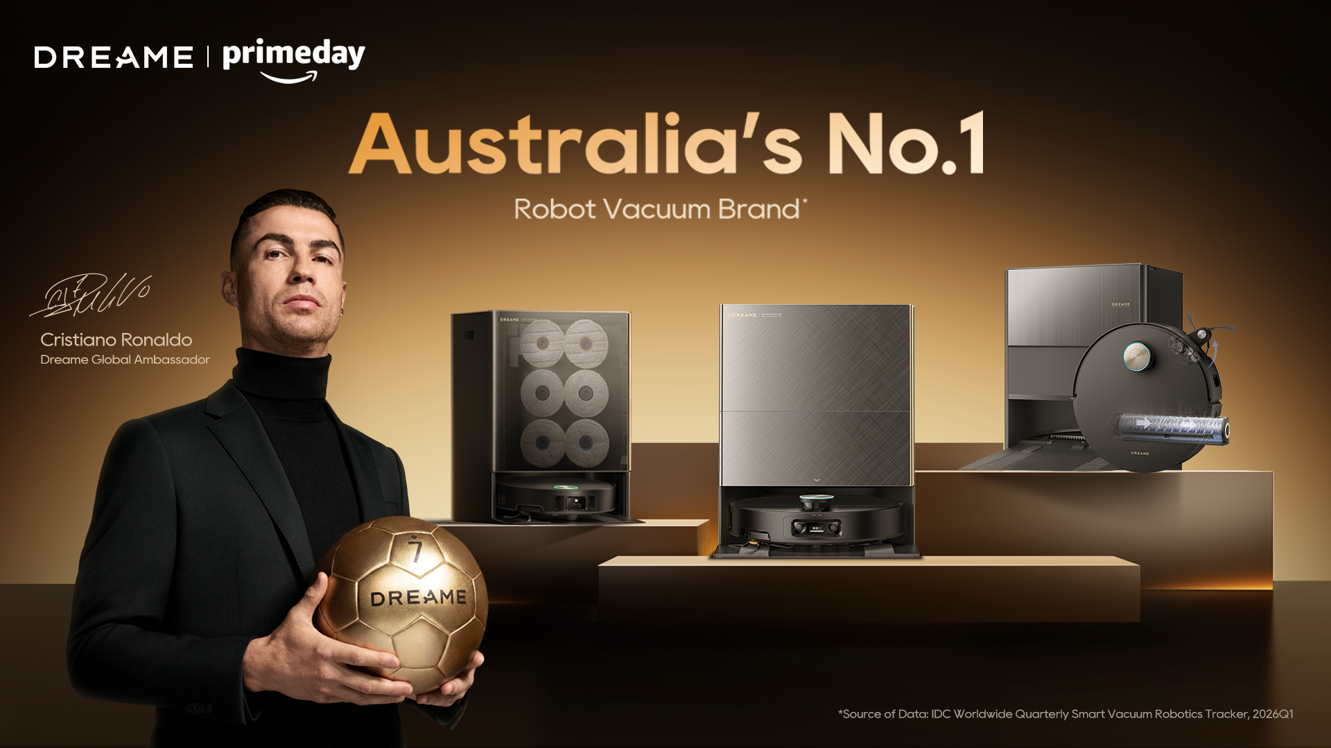 Cristiano Ronaldo holding a gold Dreame-branded football in front of some Dreame robovacs