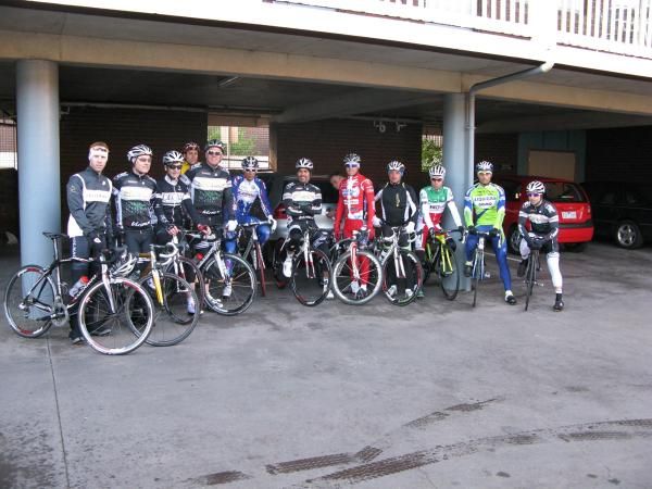 Paolo Bettini poses for a photo with the Italian riders and the locals that showed them around the worlds course.